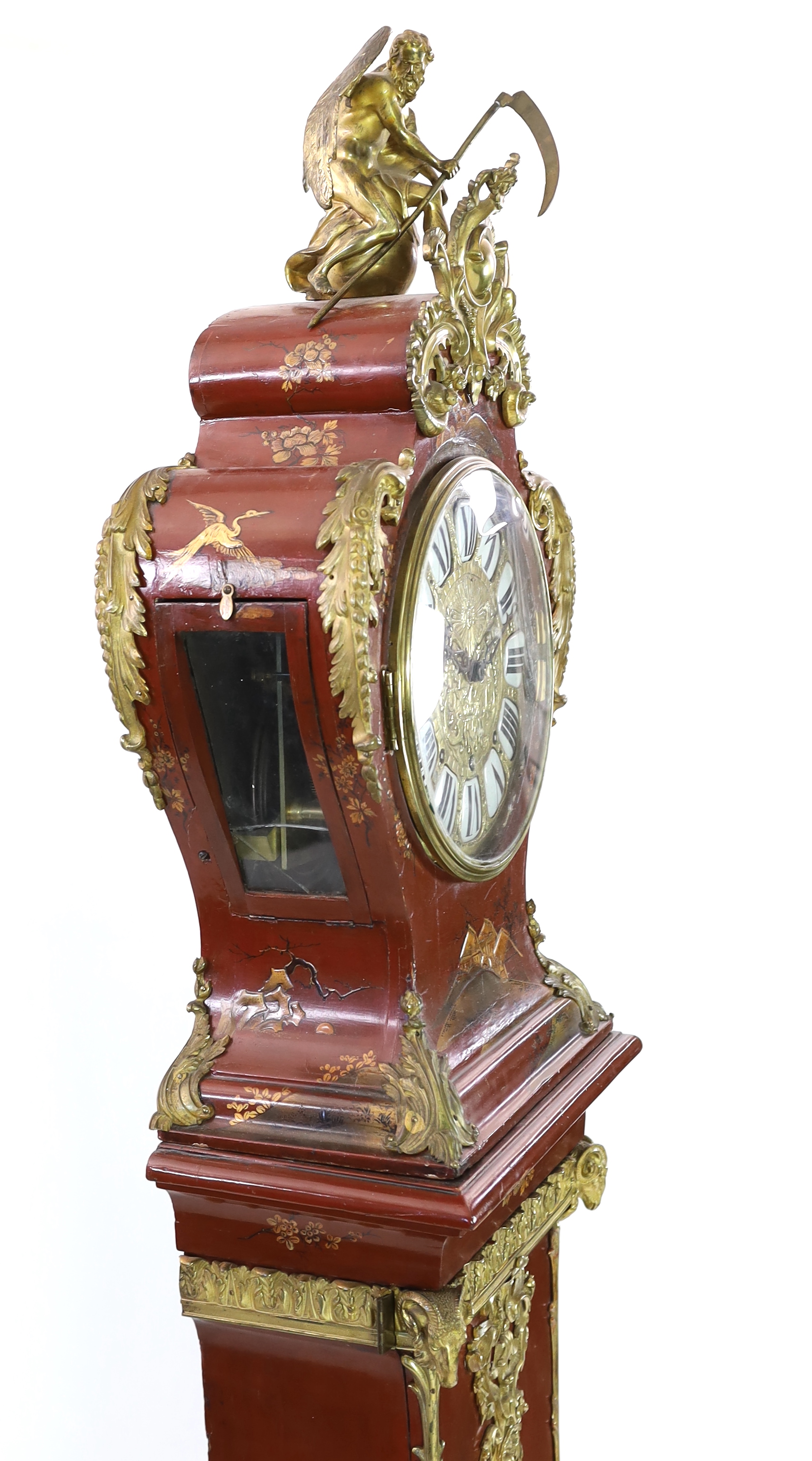 A Louis XV style ormolu mounted red chinoiserie lacquer longcase clock, 46cm wide, 33cm deep, 238cm high, Please note this lot attracts an additional import tax of 5% on the hammer price